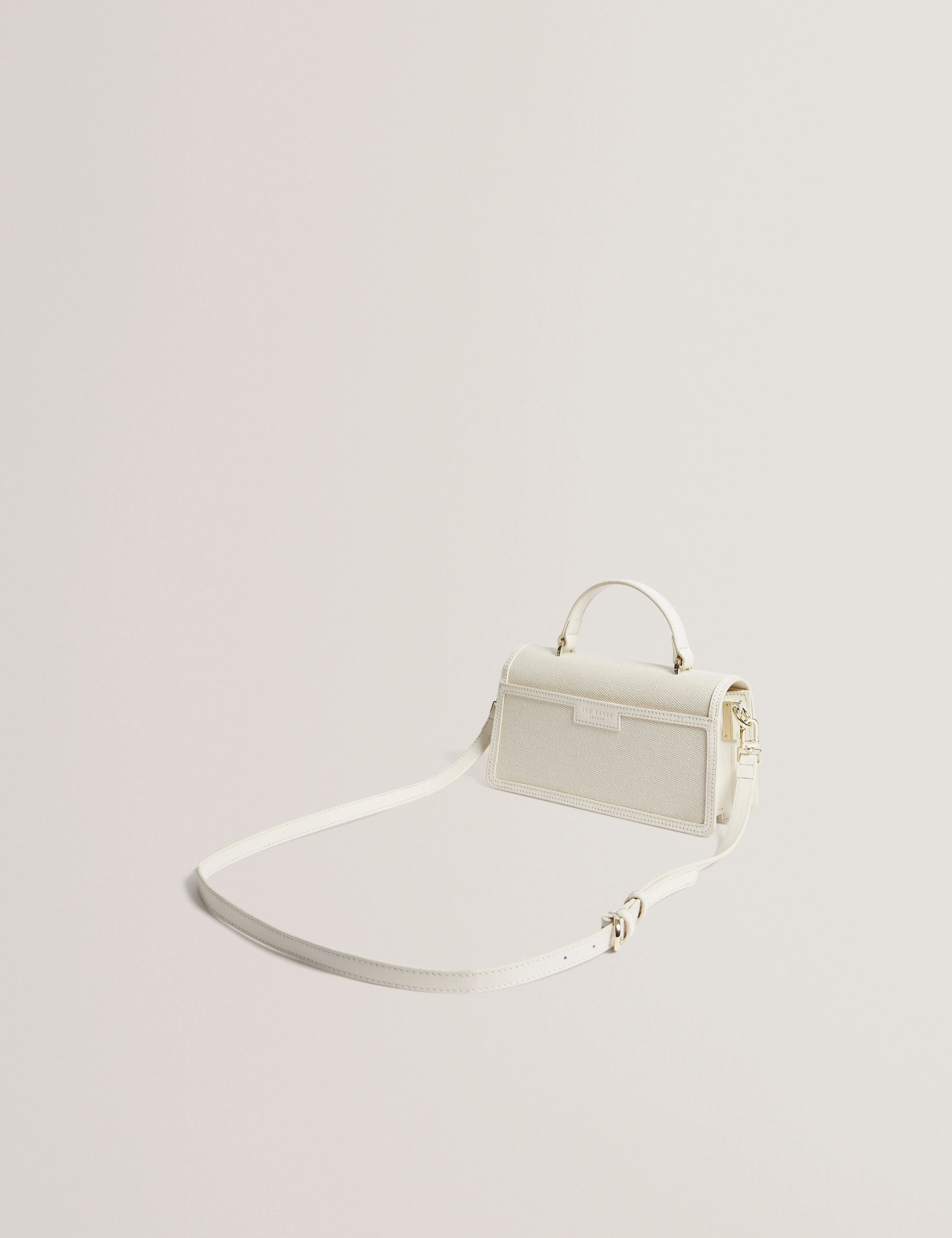 Audris Canvas Rose Hardware Elongate Ecru